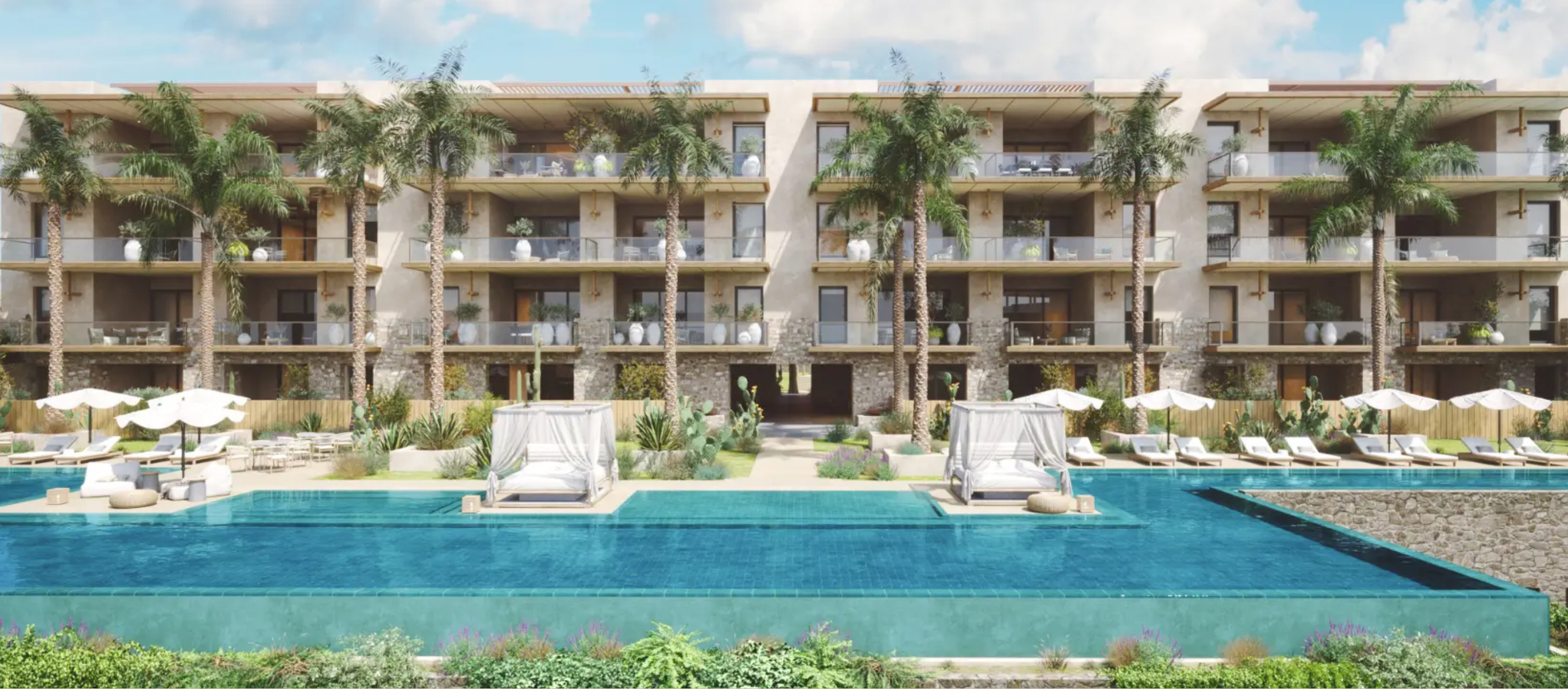 Ocean view condo at The Canyon Los Cabos, featuring modern design and rooftop options